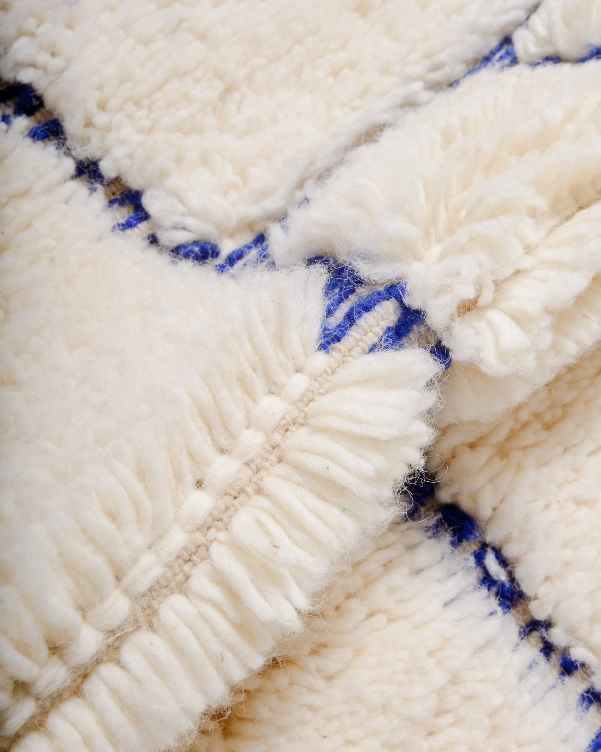 Close up of wool pile of berber rug.